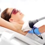Woman undergoing an underarm laser hair removal